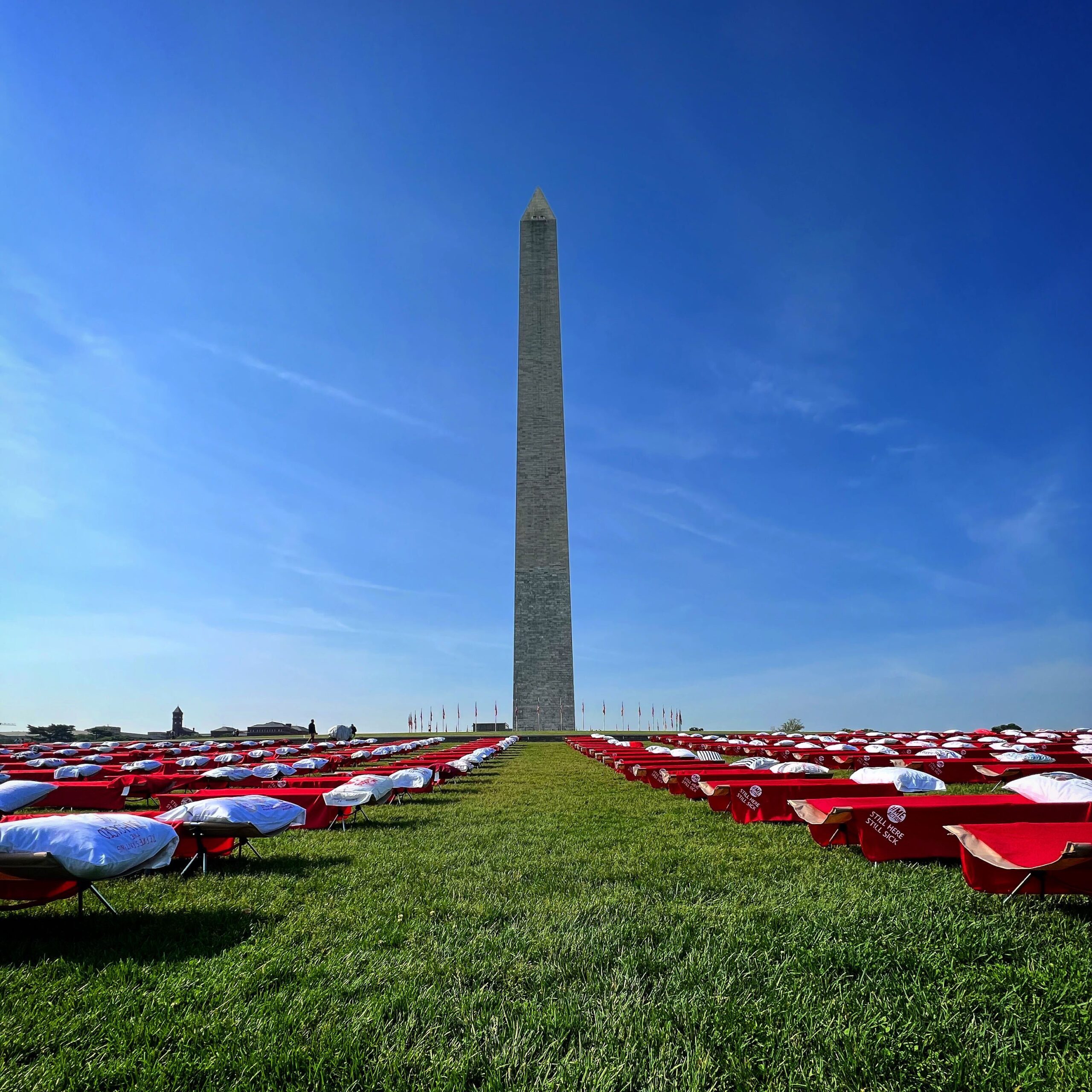 Red cots laid out in front of the Washington Monument.
